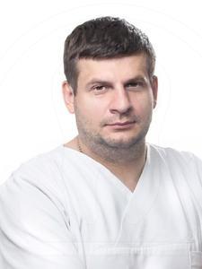 Врач стоматолог мурманск. Кармакулов стоматолог хирург Мурманск.