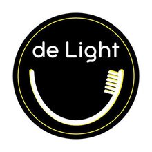 Стоматология De Light - логотип
