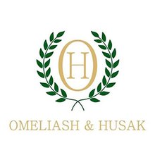 Стоматологія Omeliash &amp; Husak - логотип